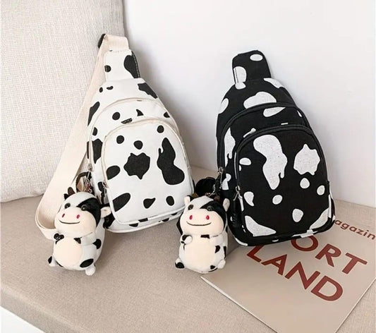 Mini cow print sling bag