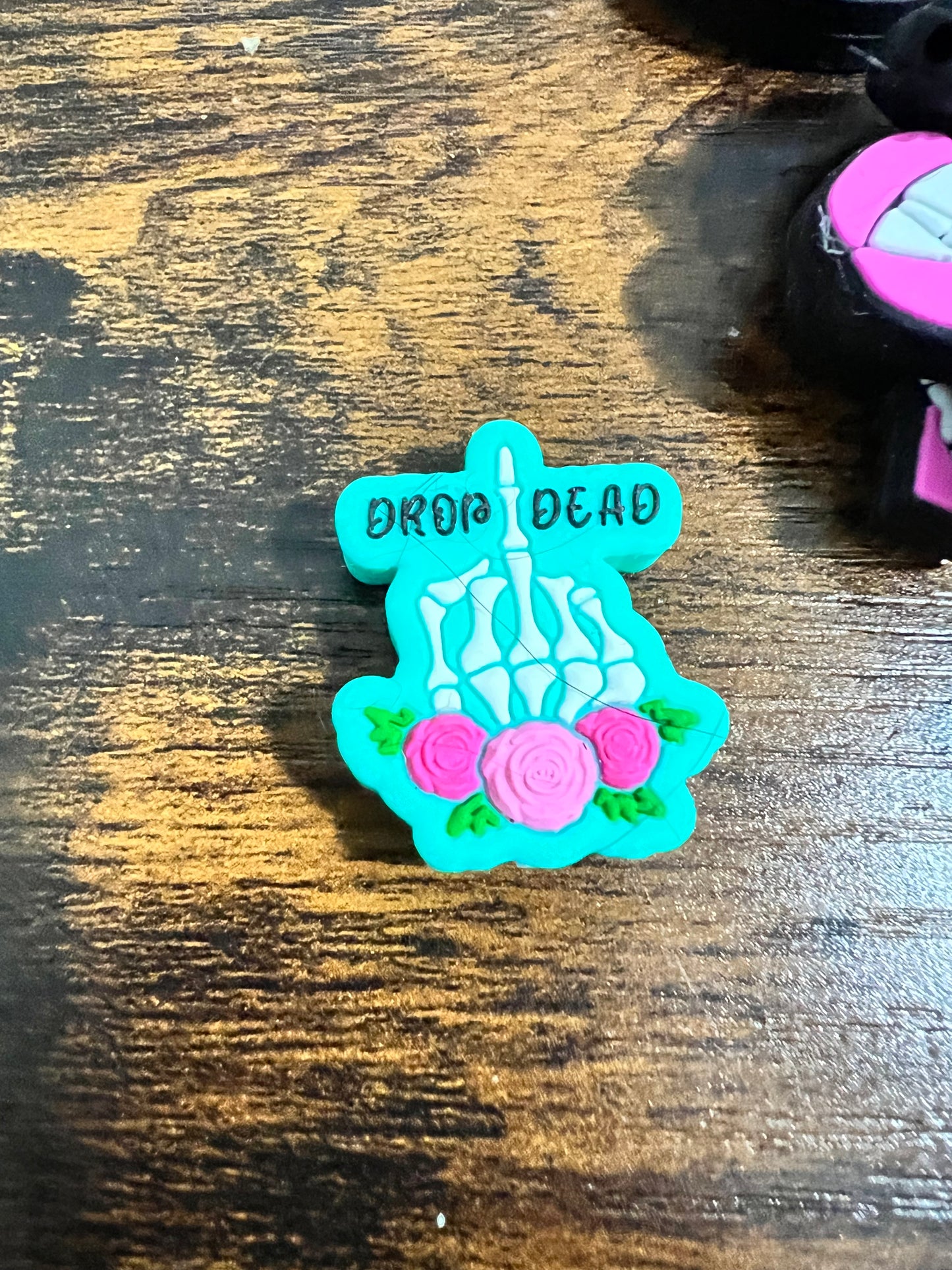 Drop dead focal bead