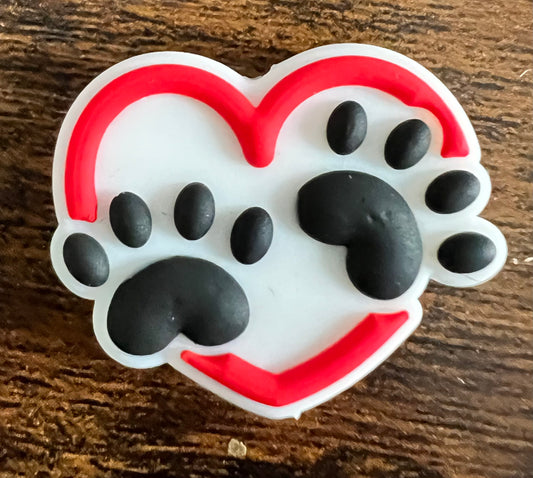 Paw prints in red lined heart